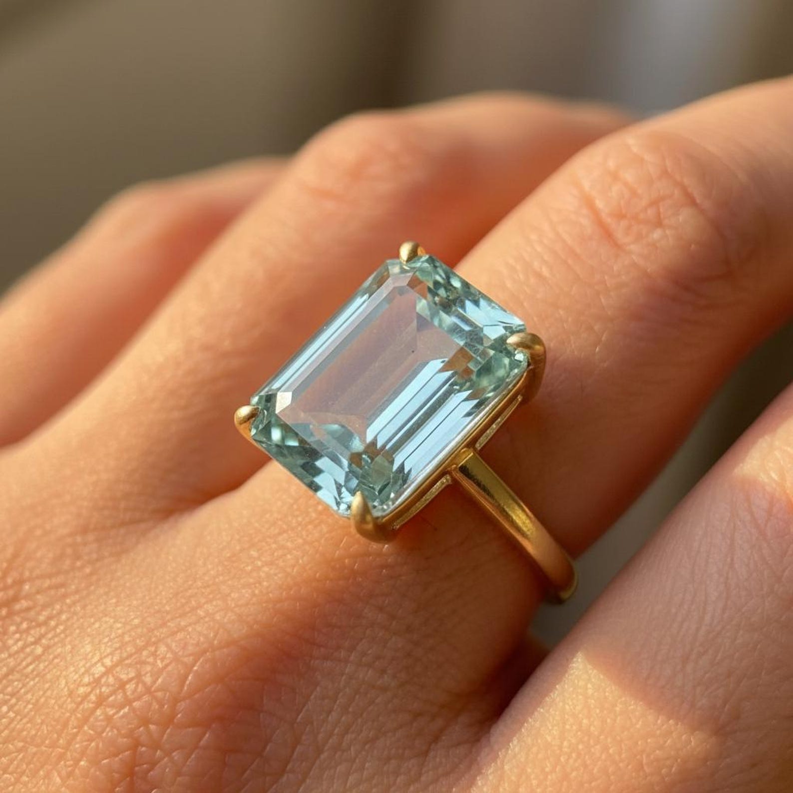 16×12 mm Emerald-Cut Lab-Created Aquamarine Statement Ring — on-hand view
