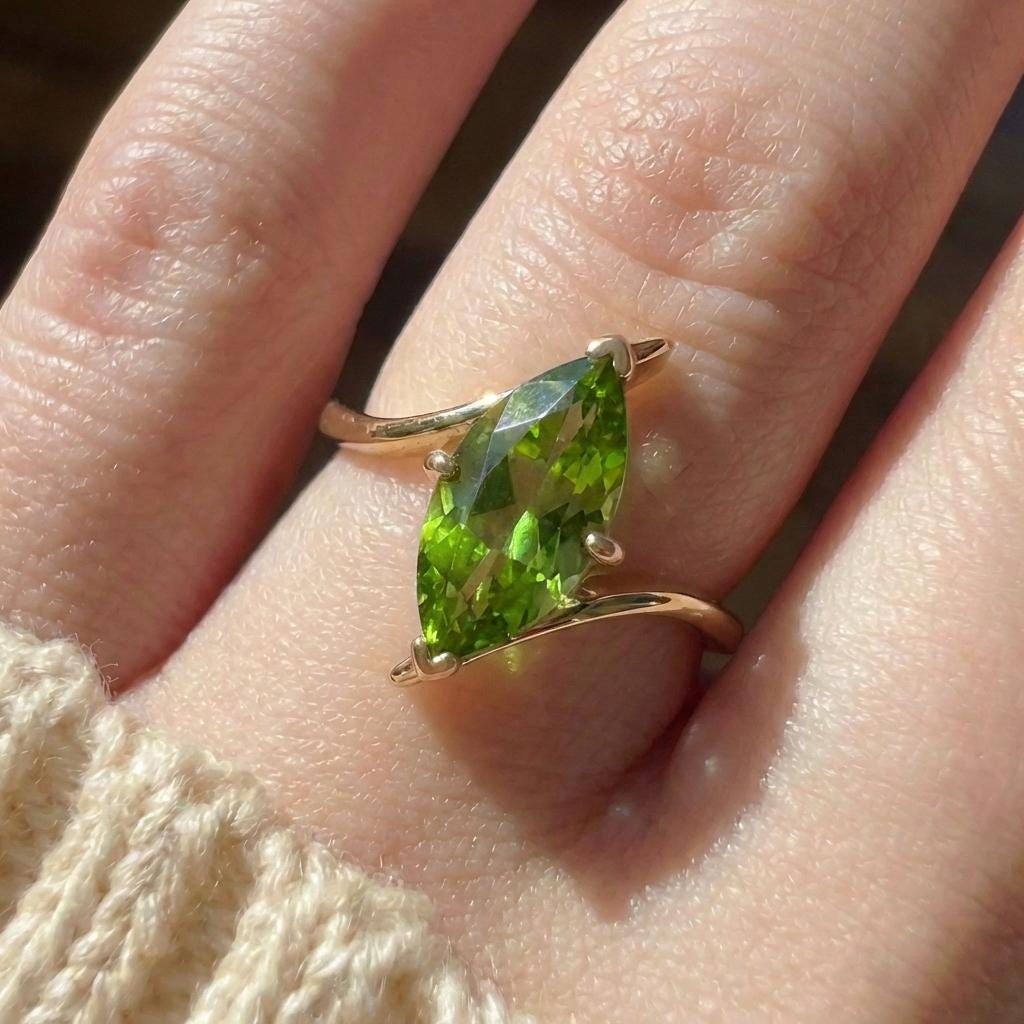 1.5ct Peridot Ring, Marquise Cut Emerald Solitaire, Curved Bypass Band, August Birthstone, 14K Gold Nature Inspired Ring