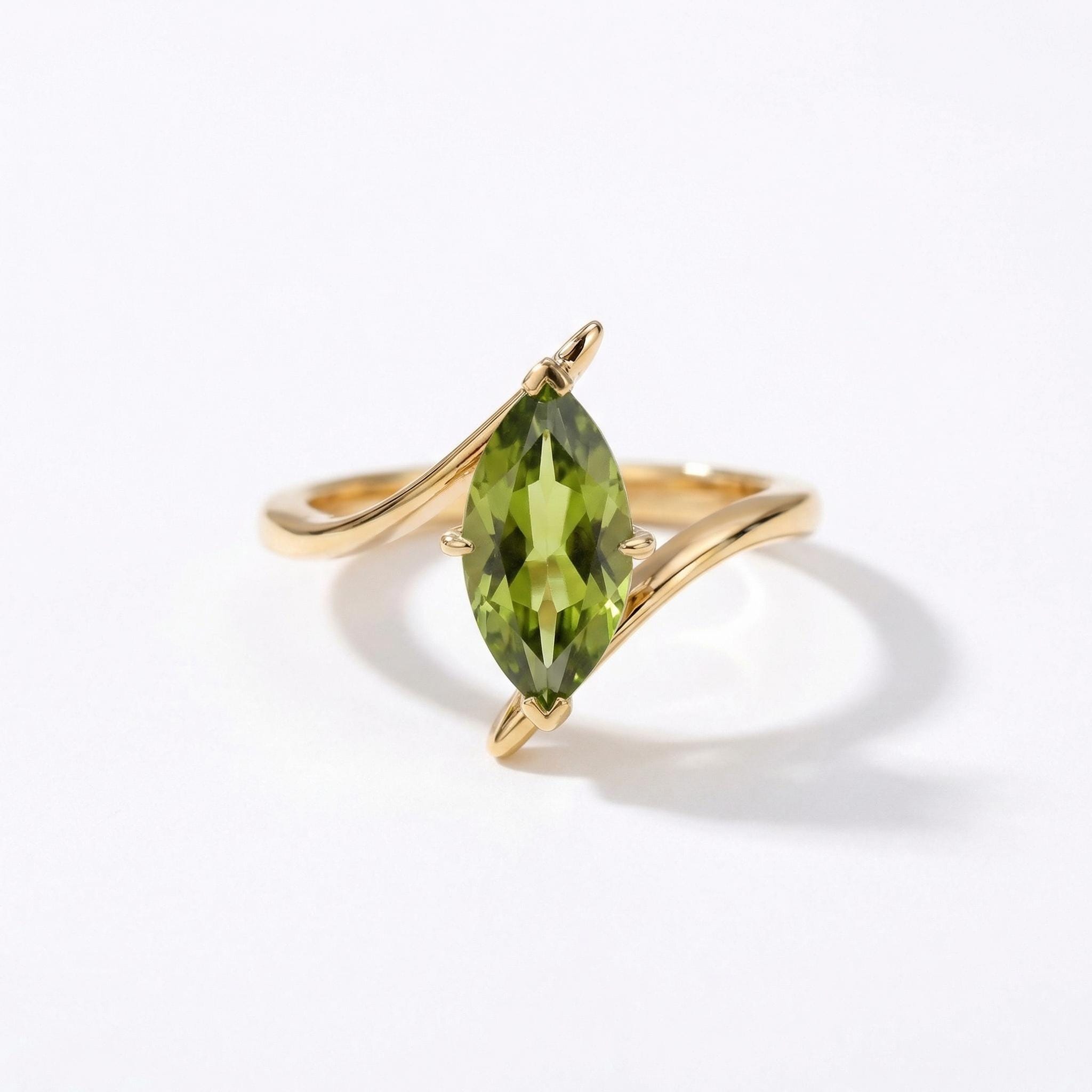 1.5ct Peridot Ring, Marquise Cut Emerald Solitaire, Curved Bypass Band, August Birthstone, 14K Gold Nature Inspired Ring
