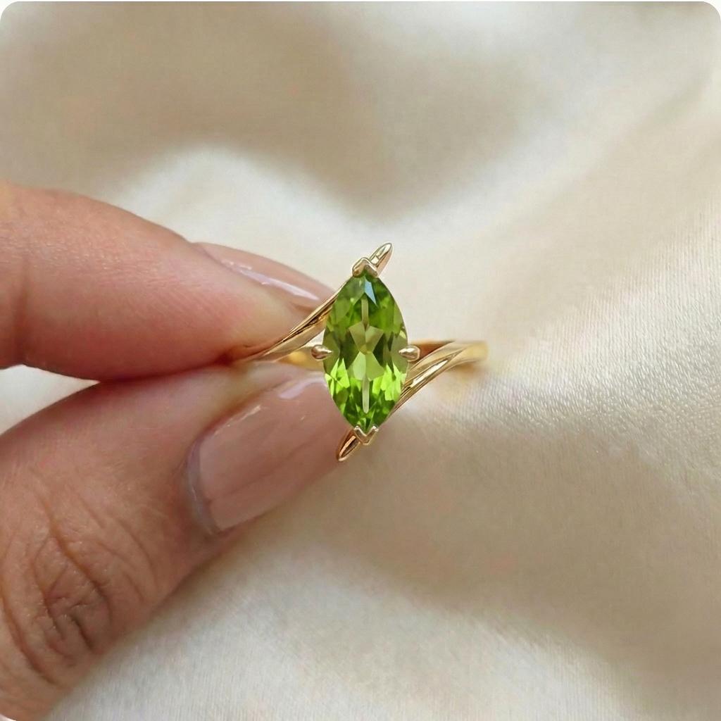 1.5ct Peridot Ring, Marquise Cut Emerald Solitaire, Curved Bypass Band, August Birthstone, 14K Gold Nature Inspired Ring