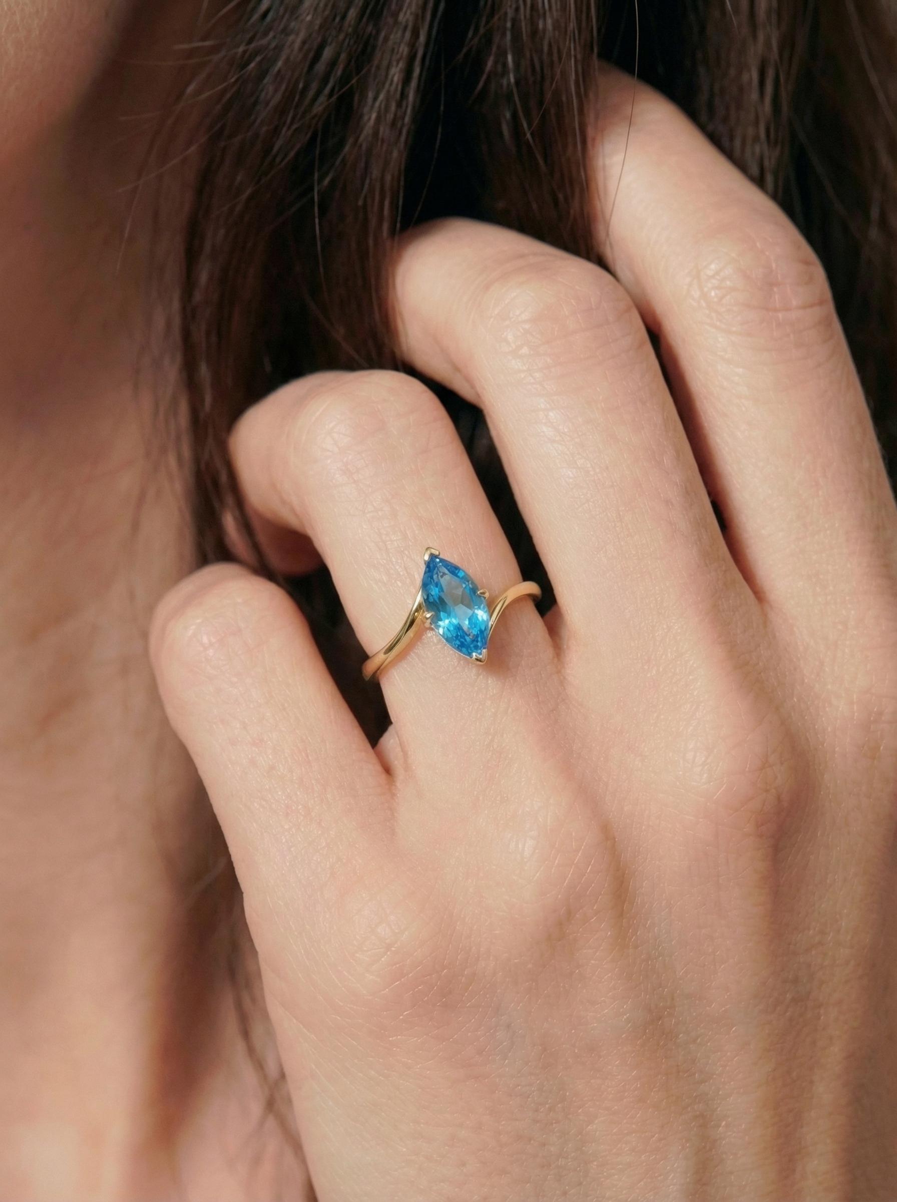 1.5ct Marquise Blue Zircon Ring, December Birthstone Engagement Ring, 14K Gold Curved Bypass Nature Inspired Ring