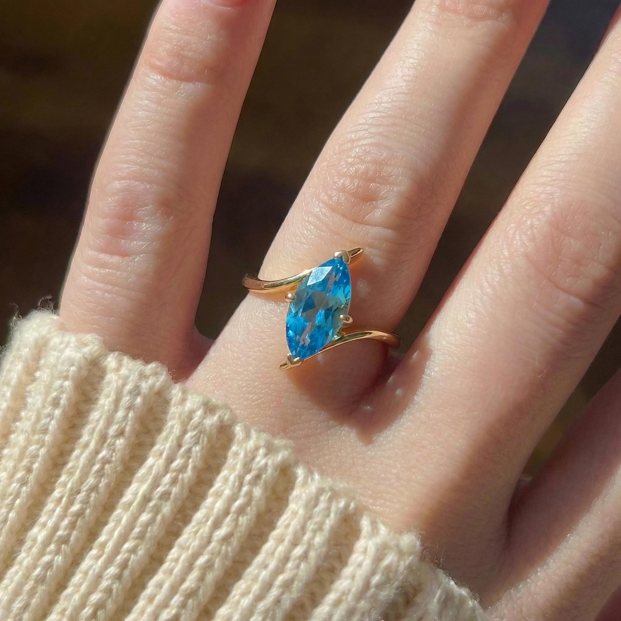 1.5ct Marquise Blue Zircon Ring, December Birthstone Engagement Ring, 14K Gold Curved Bypass Nature Inspired Ring
