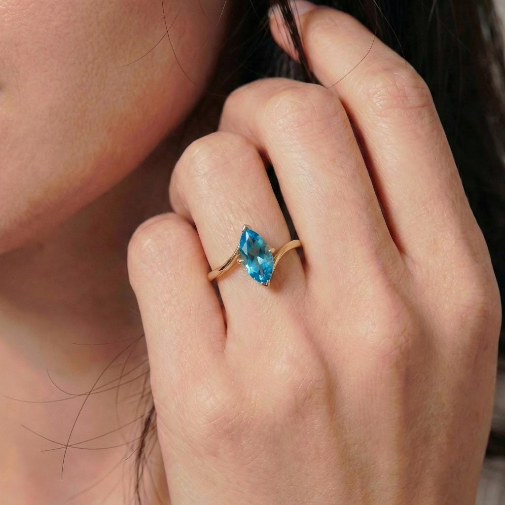 1.5ct Marquise Blue Zircon Ring, December Birthstone Engagement Ring, 14K Gold Curved Bypass Nature Inspired Ring