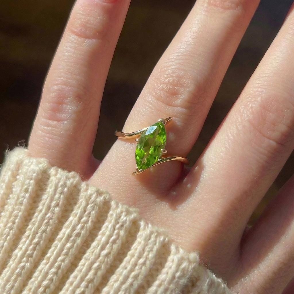 1.5ct Peridot Ring, Marquise Cut Emerald Solitaire, Curved Bypass Band, August Birthstone, 14K Gold Nature Inspired Ring