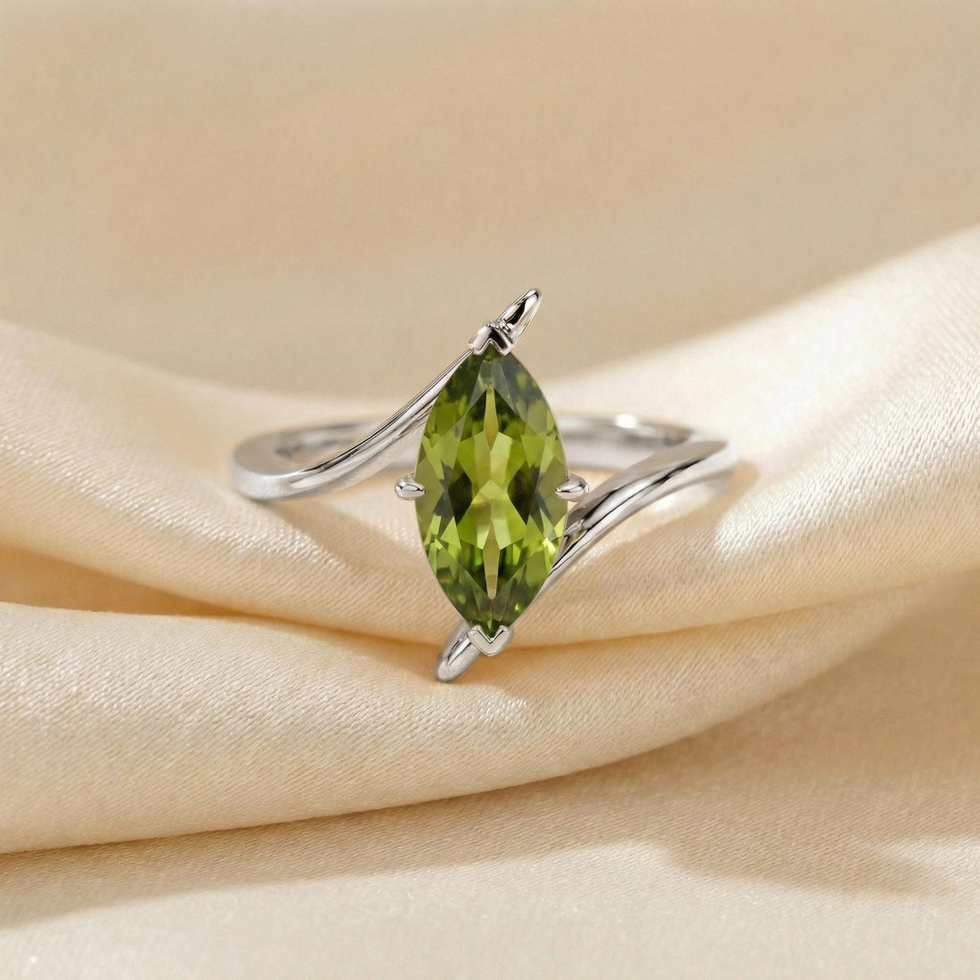 1.5ct Peridot Ring, Marquise Cut Emerald Solitaire, Curved Bypass Band, August Birthstone, 14K Gold Nature Inspired Ring