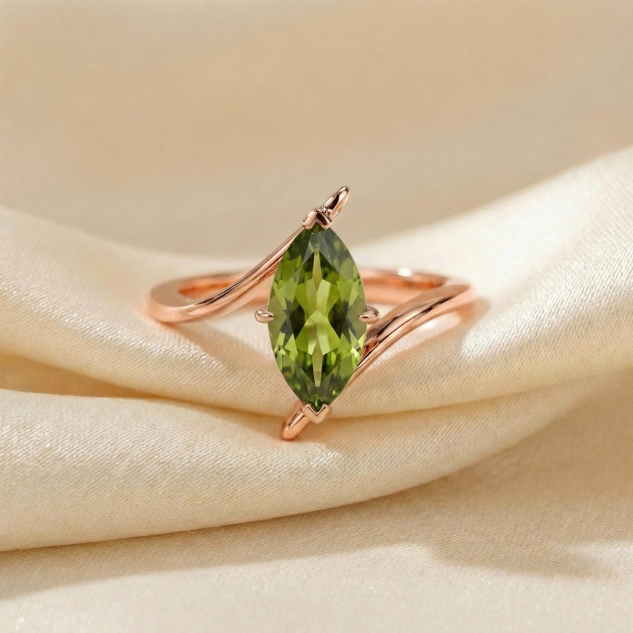 1.5ct Peridot Ring, Marquise Cut Emerald Solitaire, Curved Bypass Band, August Birthstone, 14K Gold Nature Inspired Ring