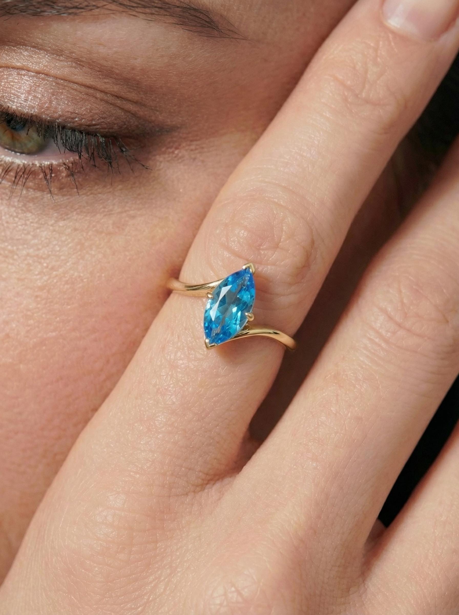 1.5ct Marquise Blue Zircon Ring, December Birthstone Engagement Ring, 14K Gold Curved Bypass Nature Inspired Ring