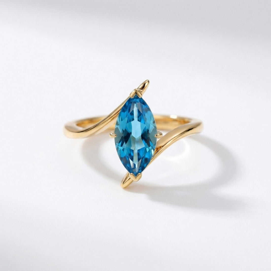 1.5ct Marquise Blue Zircon Ring, December Birthstone Engagement Ring, 14K Gold Curved Bypass Nature Inspired Ring