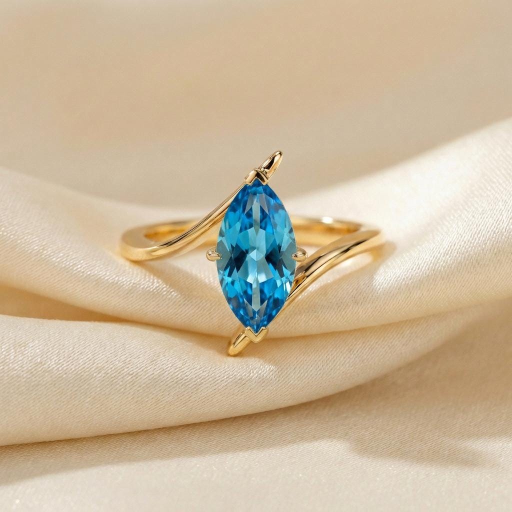 1.5ct Marquise Blue Zircon Ring, December Birthstone Engagement Ring, 14K Gold Curved Bypass Nature Inspired Ring