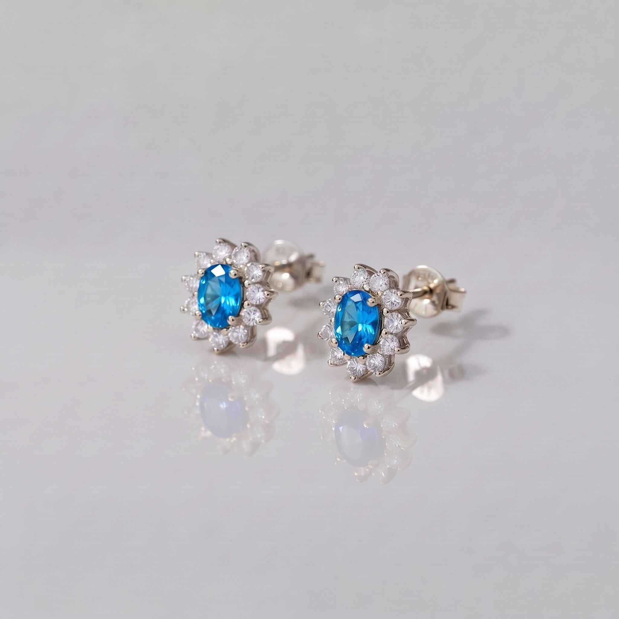 Blue Zircon Stud Earrings, CZ Halo Earrings, Oval Blue Gemstone Studs, December Birthstone Jewelry