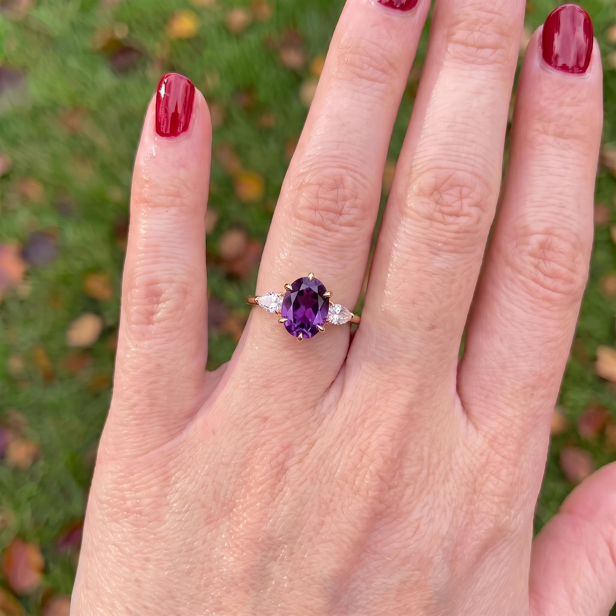 Oval Amethyst-Colored CZ Three-Stone Ring in 925 Sterling Silver