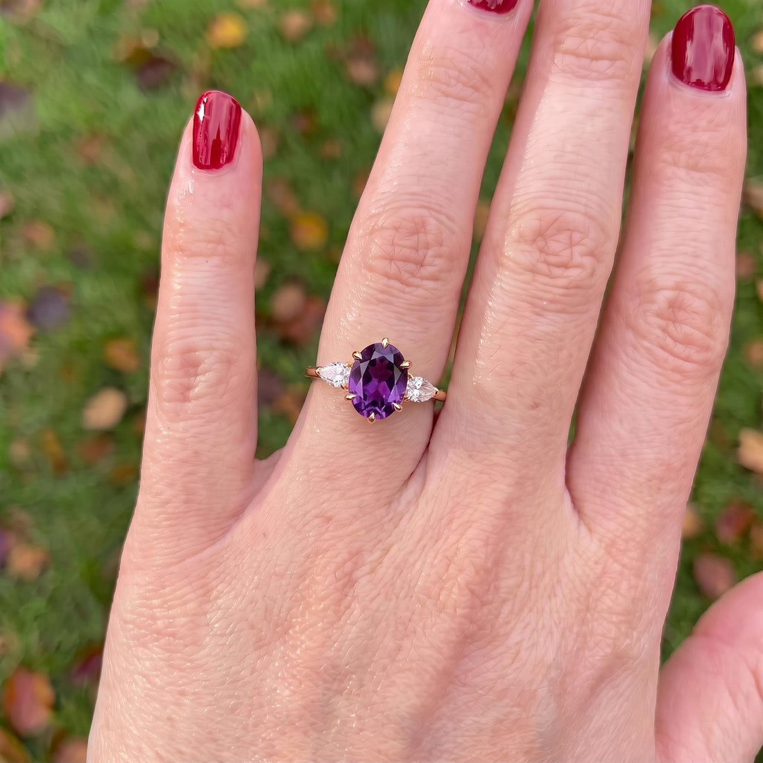 Oval Amethyst-Colored CZ Three-Stone Ring in 925 Sterling Silver