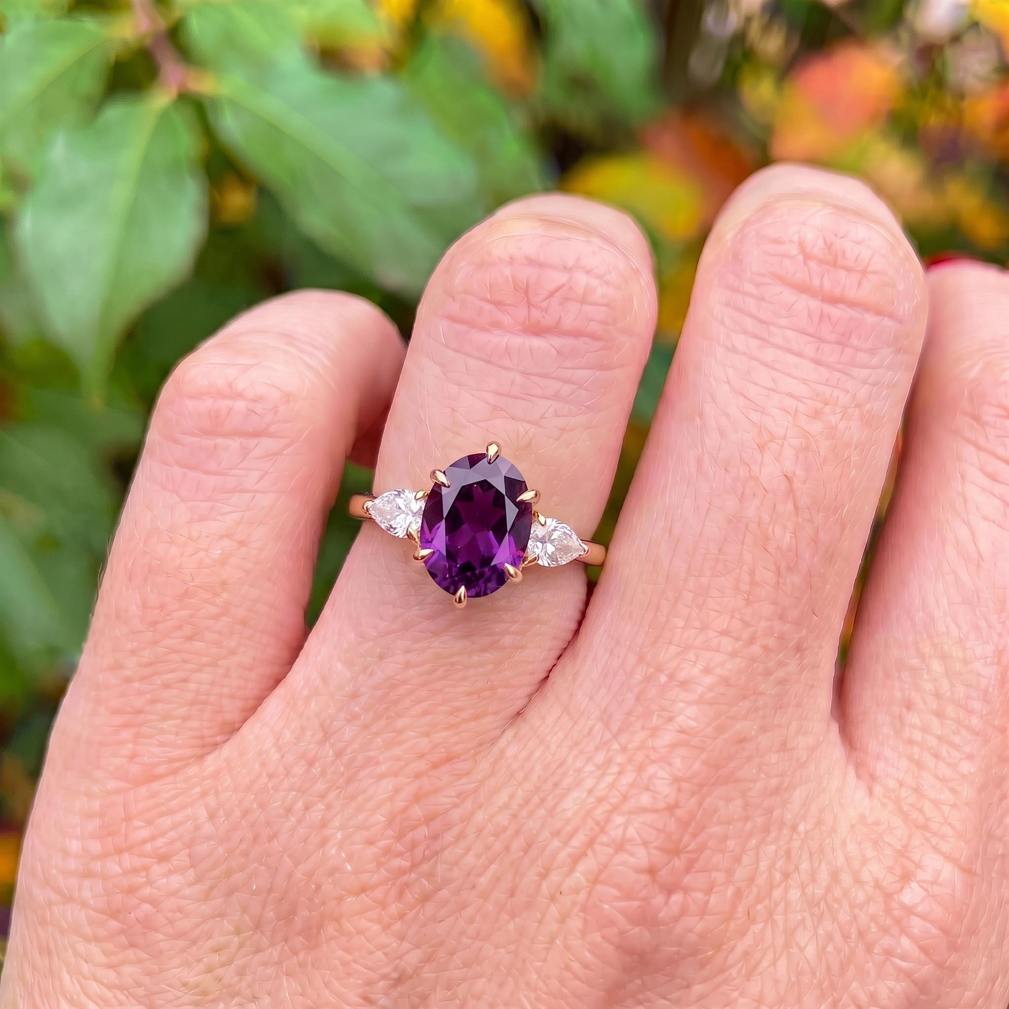 Oval Amethyst-Colored CZ Three-Stone Ring in 925 Sterling Silver