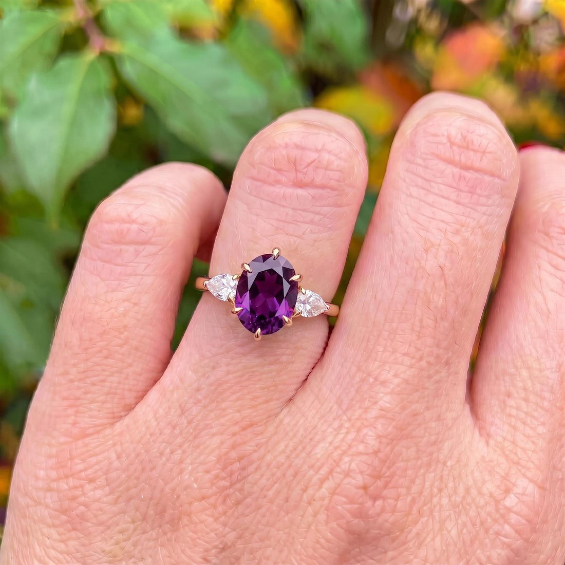 Oval Amethyst-Colored CZ Three-Stone Ring in 925 Sterling Silver