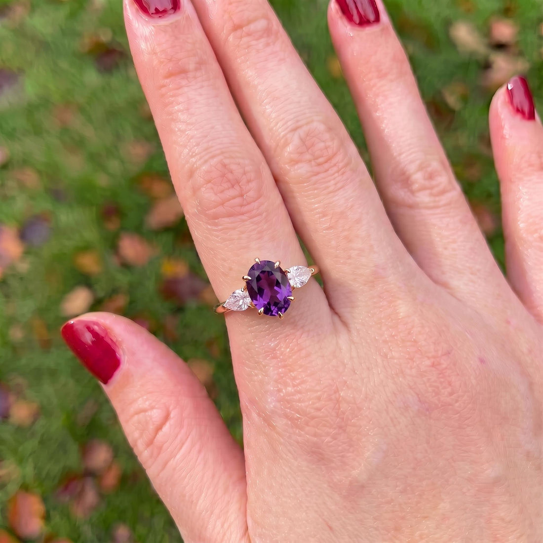Oval Amethyst-Colored CZ Three-Stone Ring in 925 Sterling Silver