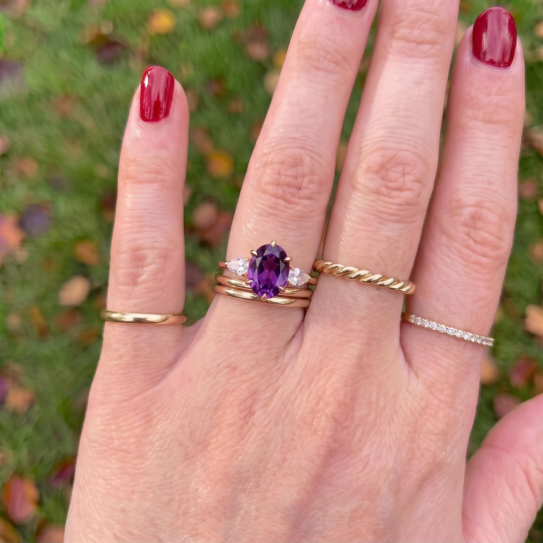 Oval Amethyst-Colored CZ Three-Stone Ring in 925 Sterling Silver